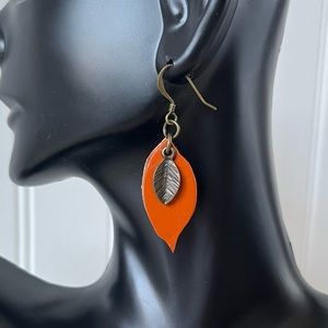 2/$25 Leather & brass orange leaf earrings